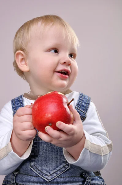 Portrait of a 1 year old boy with an apple — Photo by Cherry-Merry - depositphotos_7526587-Baby-boy-with-an-apple