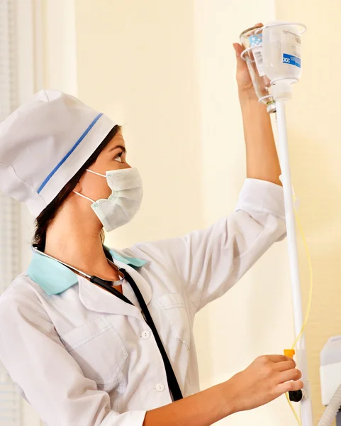 Female doctor with iv drip. — Stock Photo #7110943