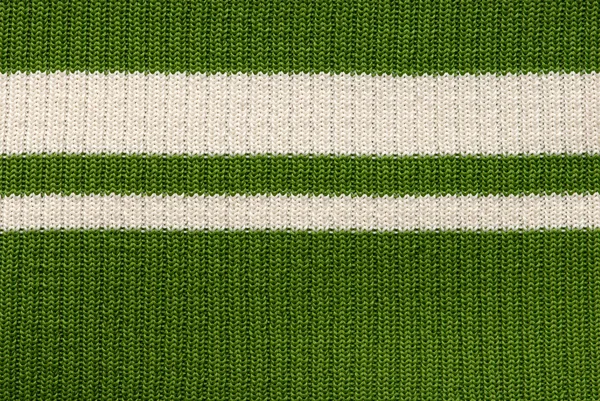 Close up of a green knitted fabric