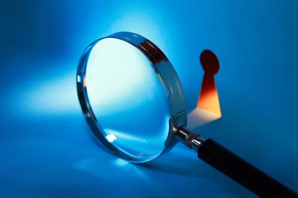 Magnifying Glass And Keyhole
