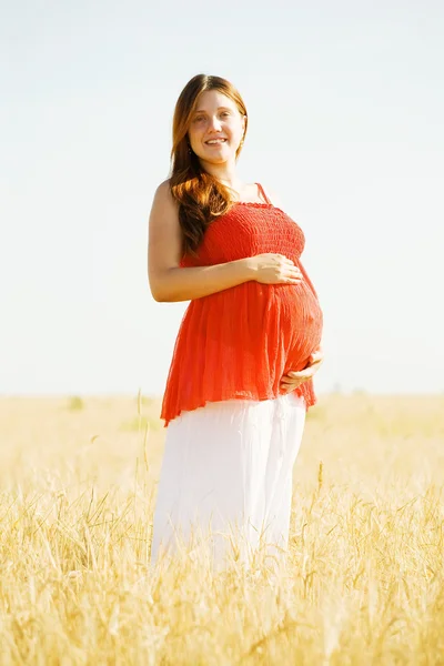 Pregnant woman in summer