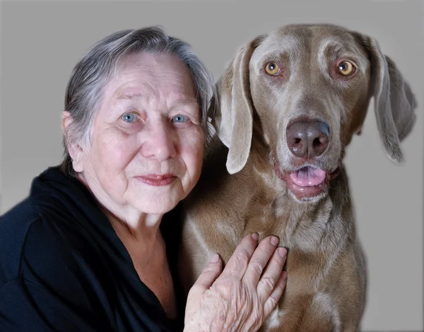 Senior woman and dog