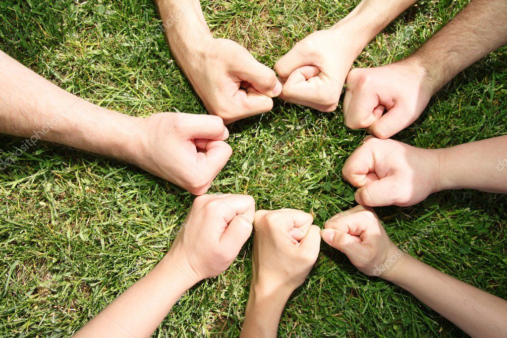 depositphotos_7435374-Friendly-fists-in-a-circle.jpg