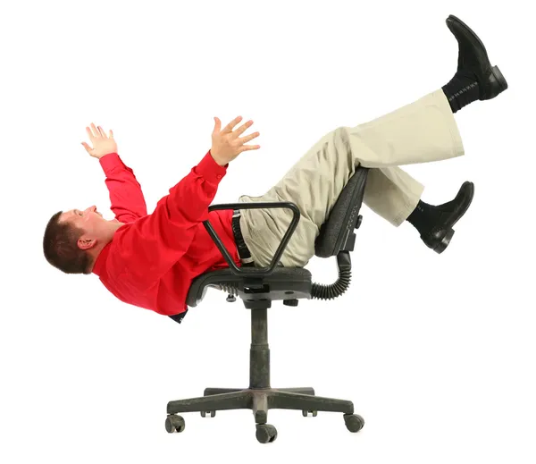 Businessman in red shirt falls from chairs upside down