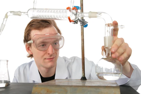 Chemist does experiment