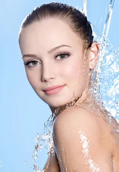 Teen with clean skin under the water