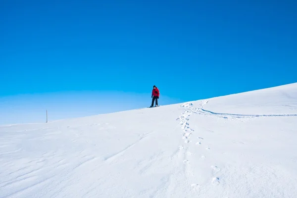 Man moves on snowboard