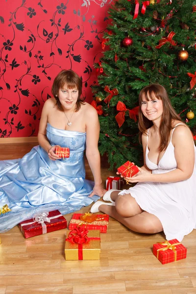 Two young women with gifts