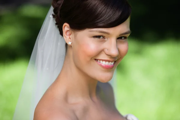 Beautiful young bride smiling