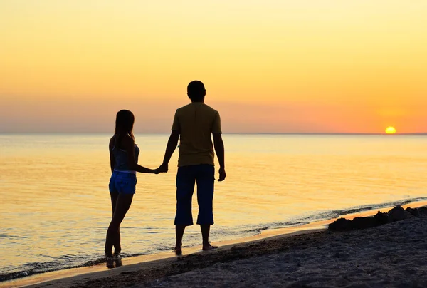 Couple silhouette on beach
