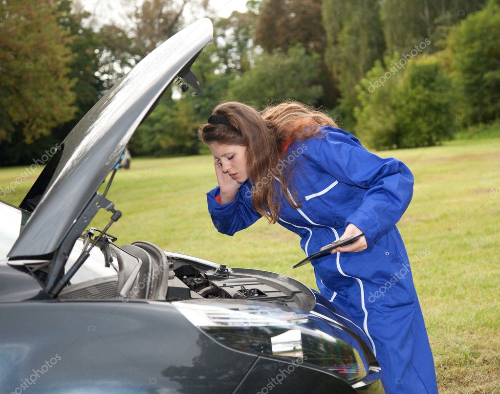 Female car mechanic with in action — Stock Photo © photomak#6768134