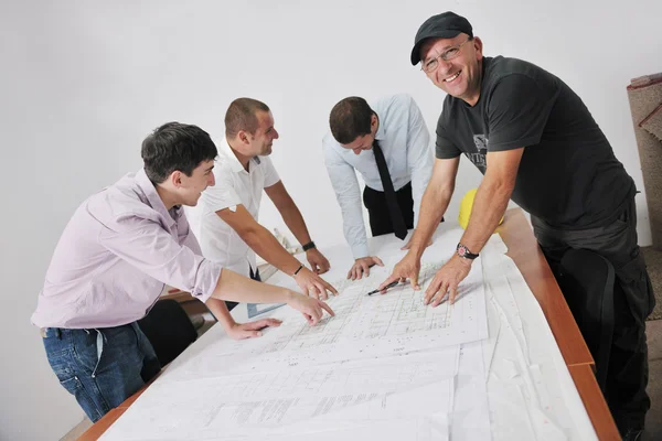 team of architects on construciton site — Stock Photo #6992098