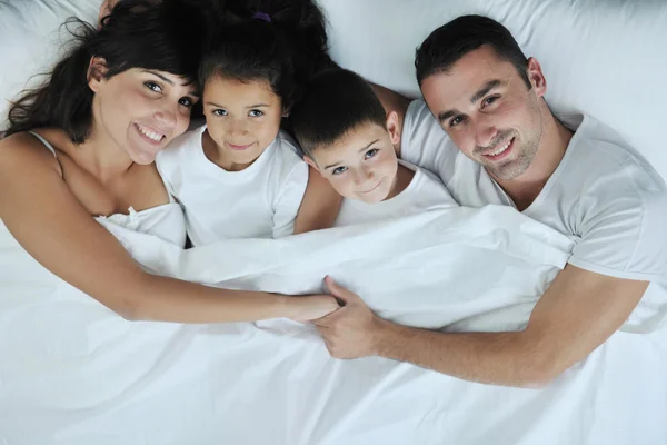 Happy young Family in their bedroom