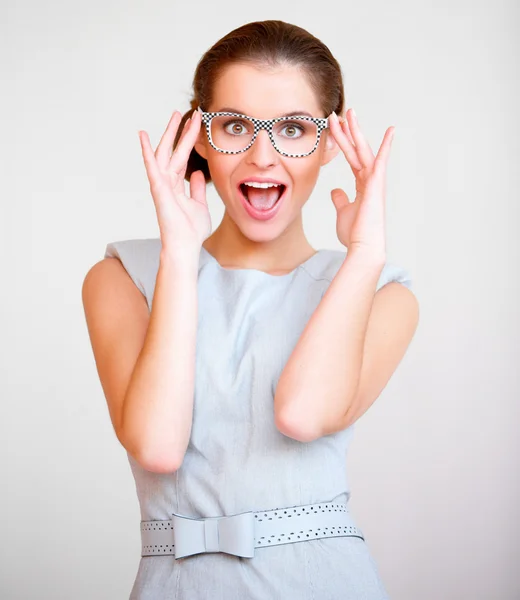 Young attractive business woman with glasses