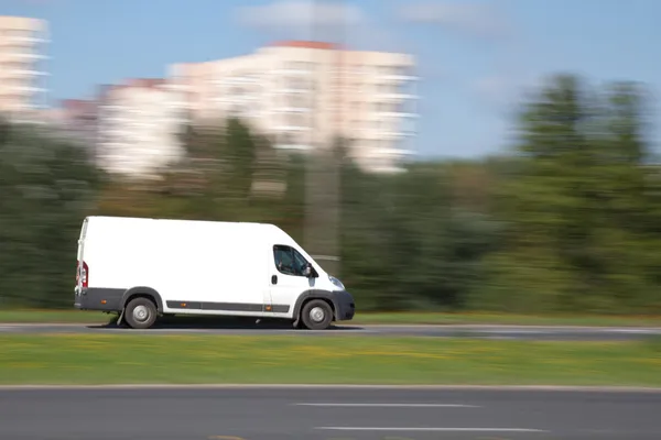 Panning image of truck with blank space