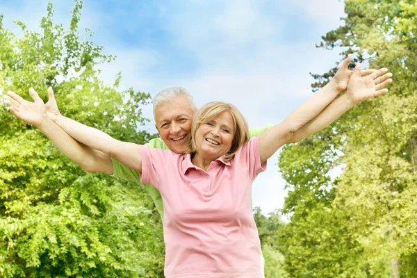 Happy elderly couple outdoors
