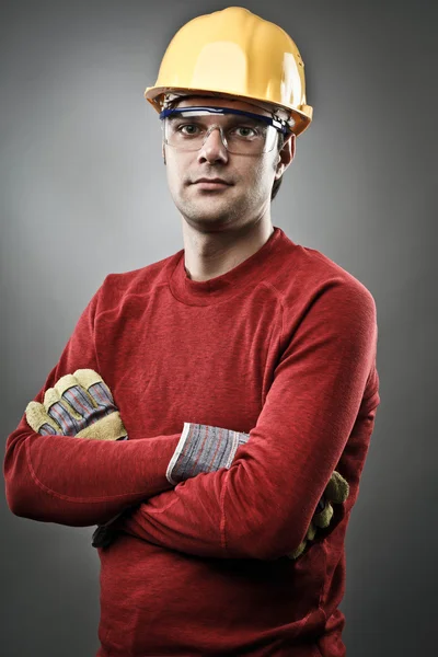 Blue collar worker with hardhat