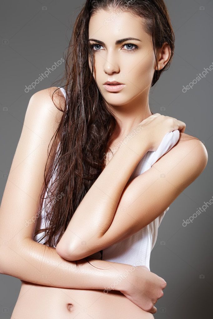 Beautiful fashion slim wet woman model in white blank tshirt