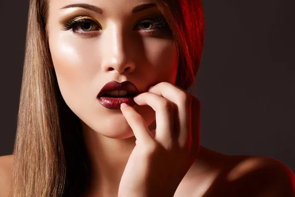 Chic evening style. Alluring woman model with luxury fashion make-up