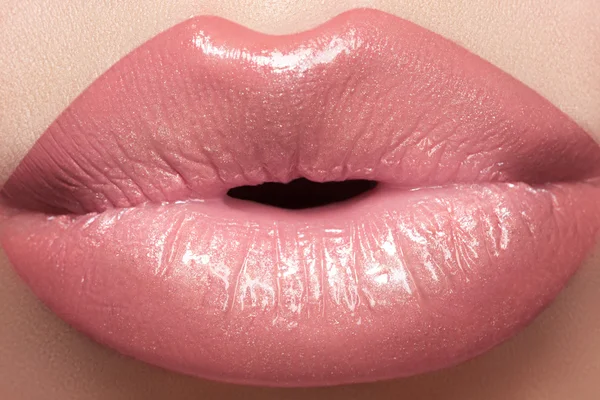 Gentle kiss. Beautiful fashion lip make-up. Macro of female lips