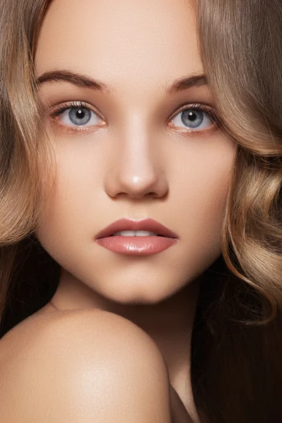 Fashion portrait of beautiful teen girl model with natural make-up