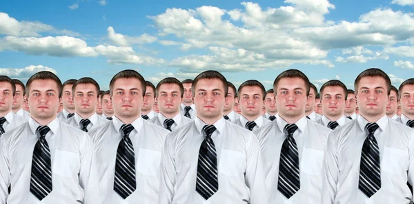 Many identical businessmen clones
