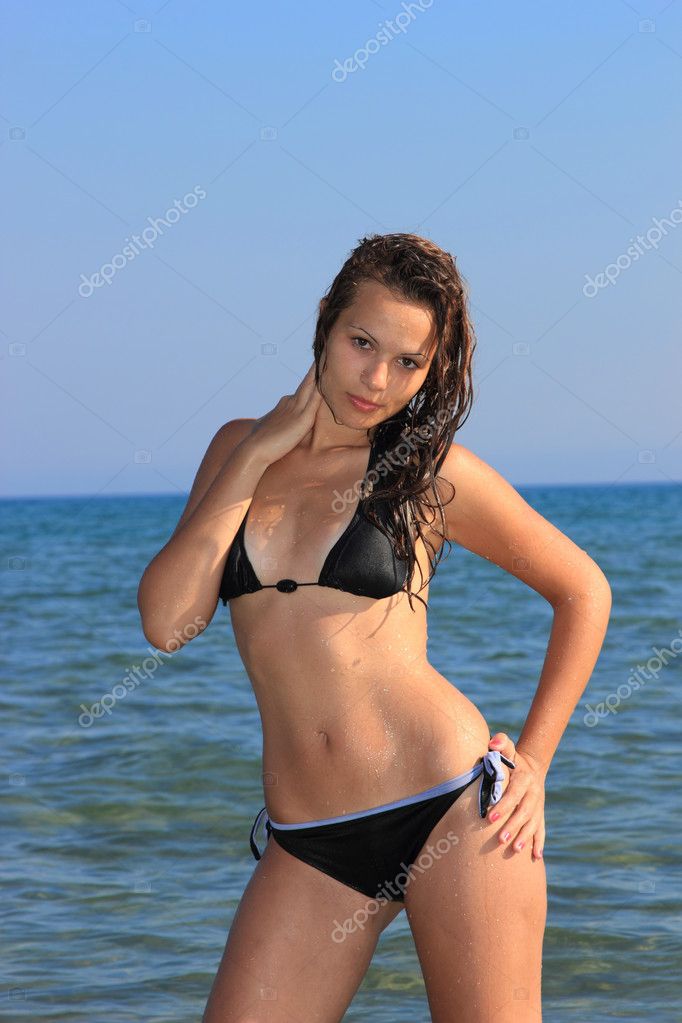 Sexy Bikini Model Posing On The Beach Stock Photo Netfalls