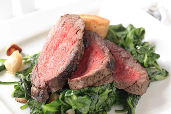 Roast beef and sauteed spinach
