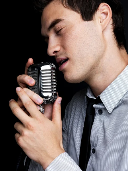  Fashioned Microphone on Singer Singing With Old Fashioned Microphone     Stock Photo  7720617