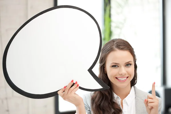 Smiling businesswoman with blank text bubble — Stock Photo #6849449