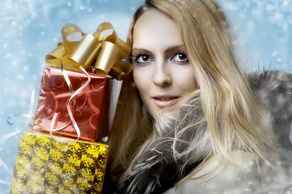 Christmas concept. woman and gift boxes