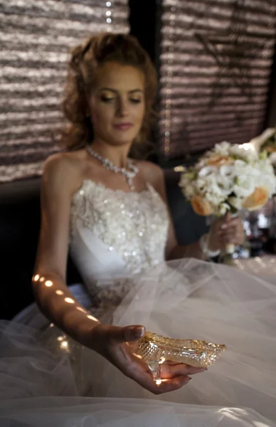 The bride with a crystal shoe.