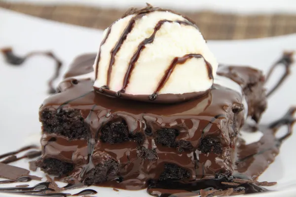 Brownie with ice cream on the dish