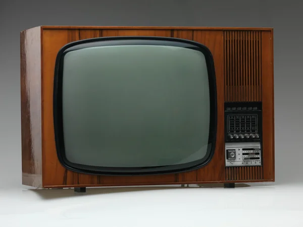 Old tv set on gray background