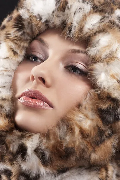 Close up of woman fur around the face