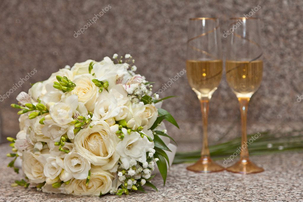 Wedding bouquet and champagne