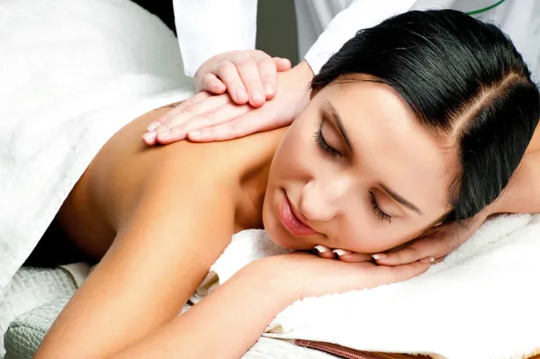 Woman receiving facial massage — Stock Photo #7858880