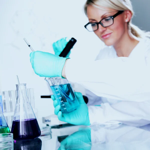 Scientist in chemical lab