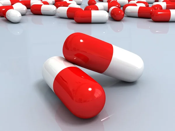 Red and white medical pills