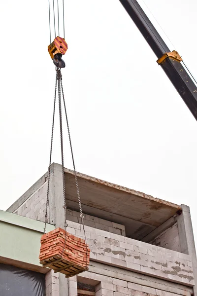 lifting bricks