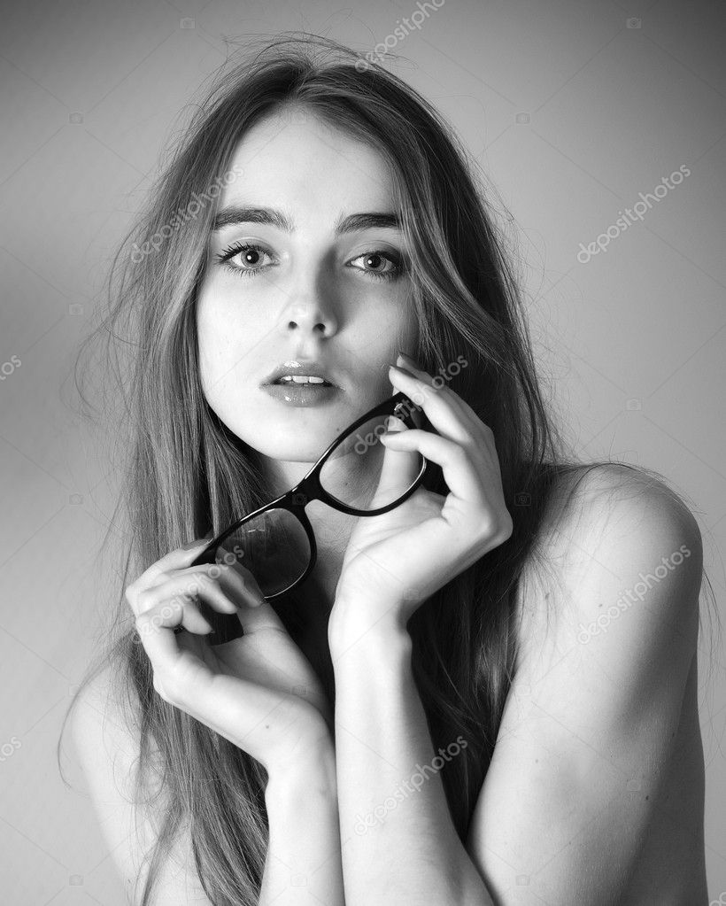 Black And White Close Up Portrait Of Beautiful Girl With Glasses In