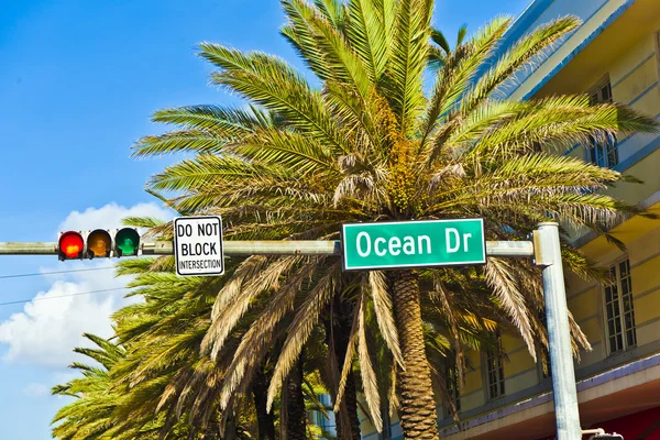 Street sign of famous street Ocean Drice in Miami South with tra