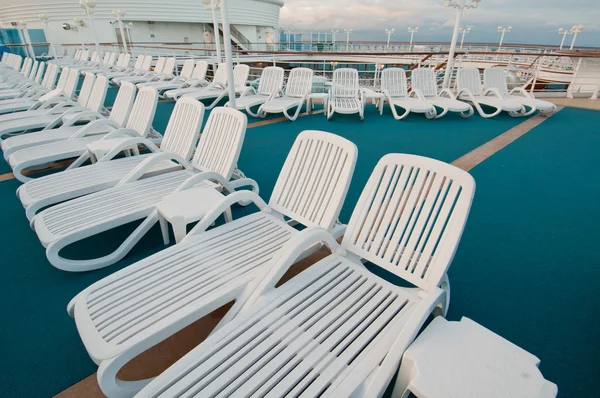 Sun tanning chairs on deck