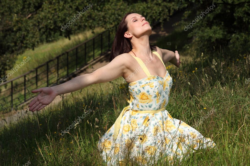 depositphotos_6992254-Woman-soaking-up-summer-sun-in-countryside.jpg