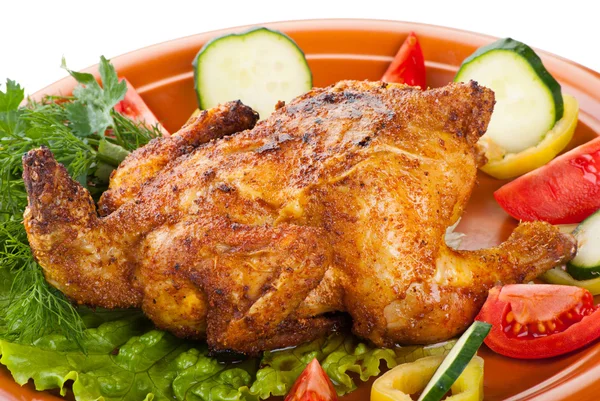 Fresh grilled whole chicken with vegetables