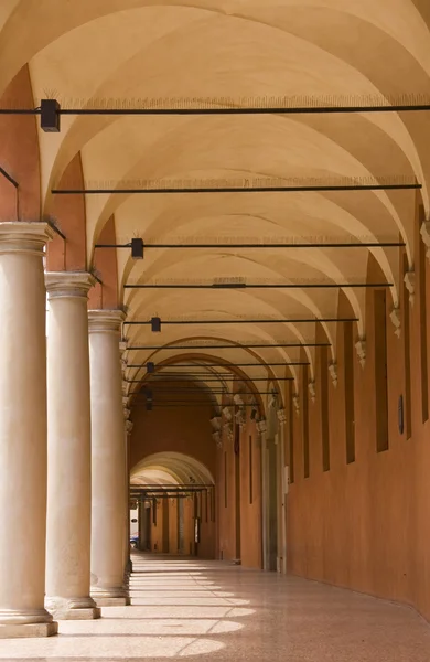 Medieval portico with columns in Bologna