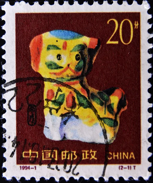 Stamp shows porcelain dog (the year of the dog)