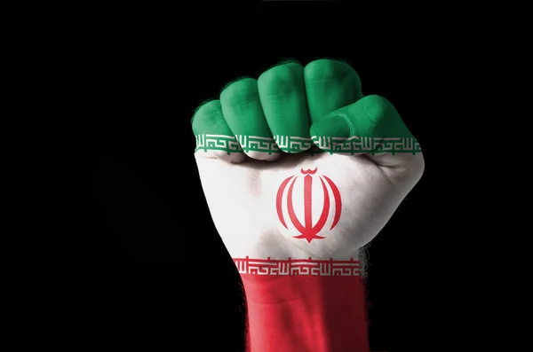 Fist painted in colors of iran flag by Vedran Vukoja - Stock Photo