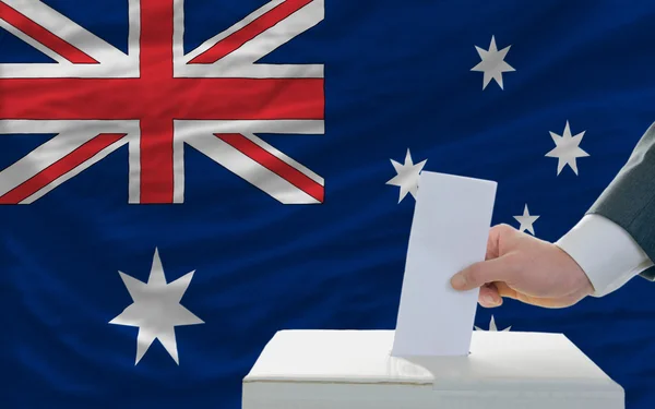Man voting on elections in australia