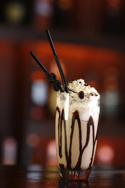 Tasty looking coffee frappe with chocolate sauce and wiped cream